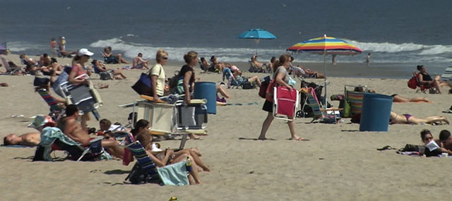 Residents Flock to Beaches to Enjoy Warm Weather