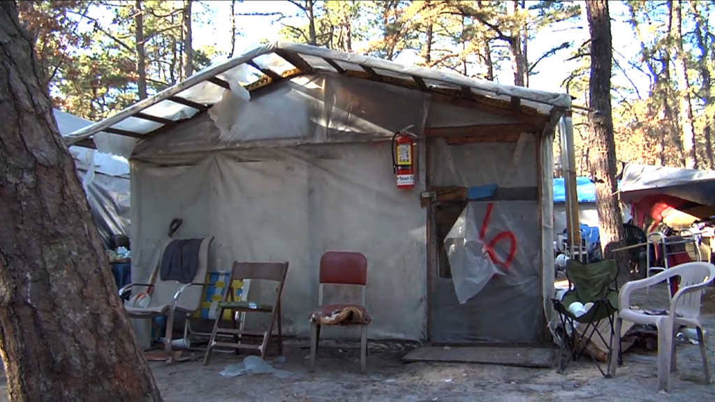 Tent City Residents Brave Bitter Cold to Stay With Belongings