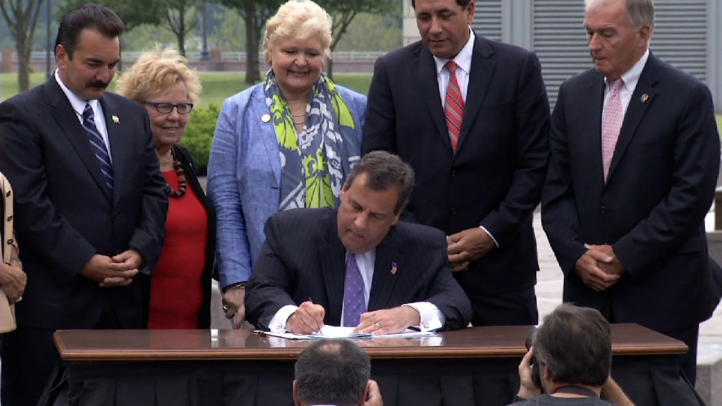 Adoption Bill Signing Marks Compromise on Heated Measure