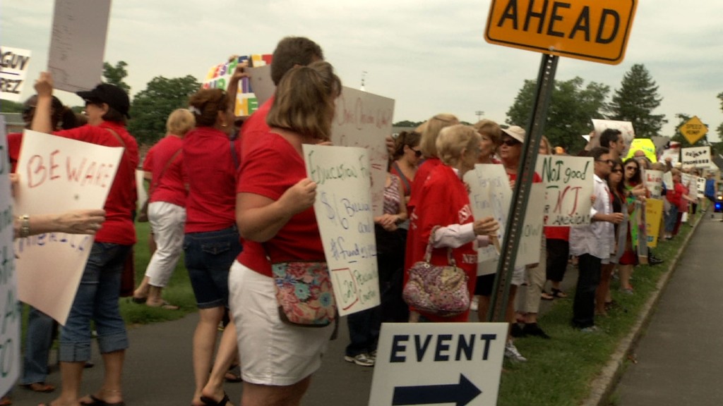 Large Group Protests Christie’s Presidential Announcement