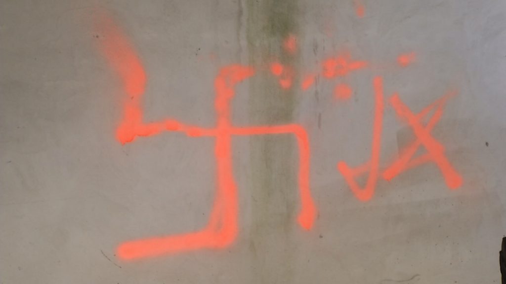 Congressional Candidate Peter Jacob Finds Swastikas on Family Home