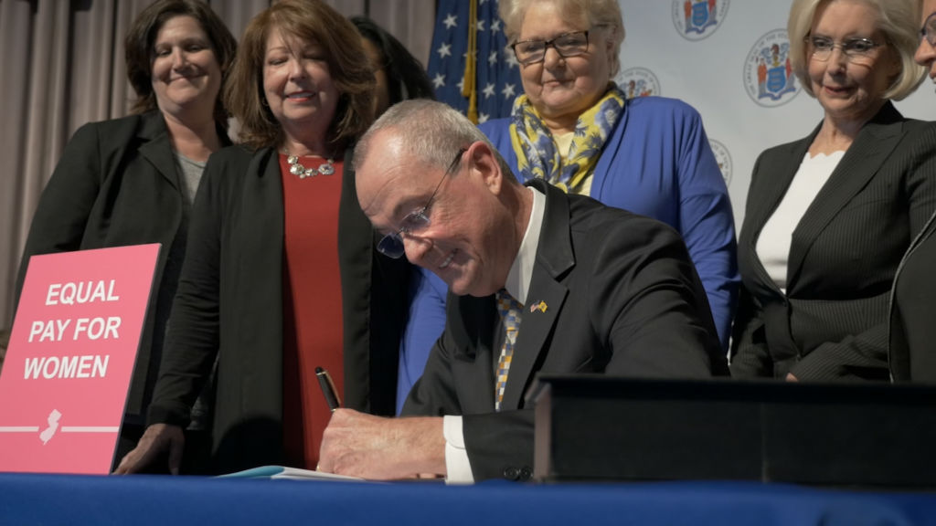 Murphy signs tough equal pay legislation