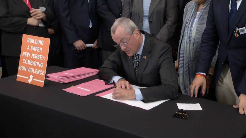 Murphy signs six gun control measures into law