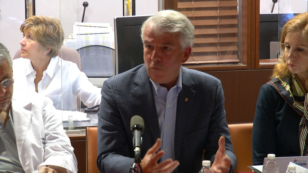 Hugin presents health care plan, Menendez pushes back