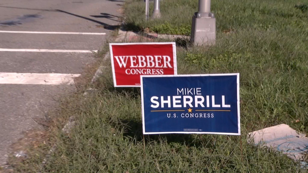 Trump a polarizing figure in 11th District race