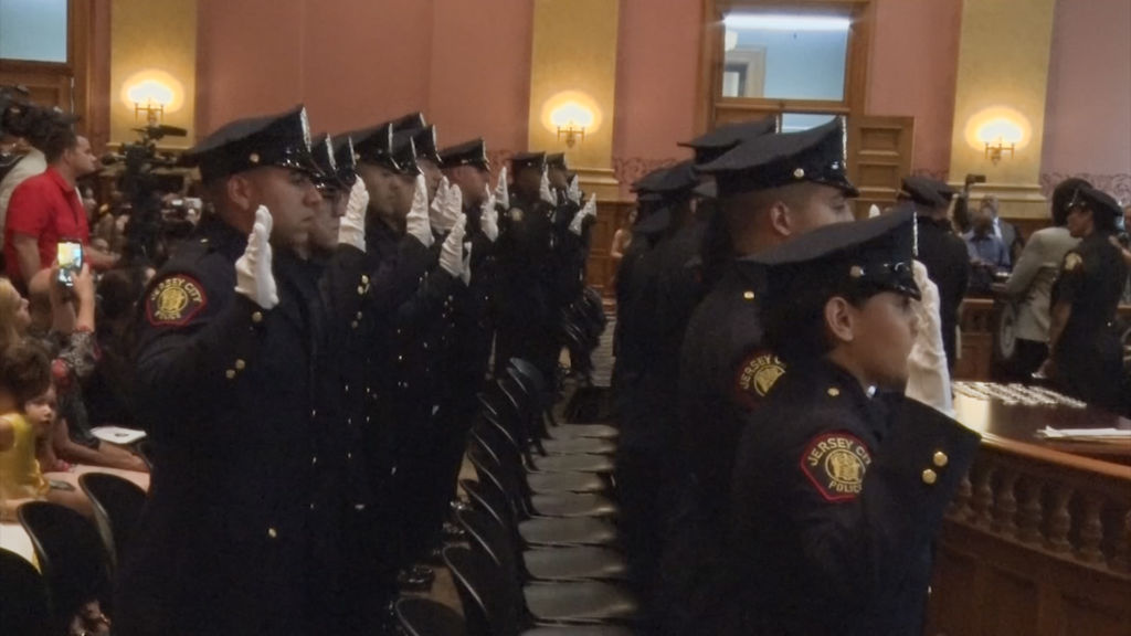 Jersey City swears in new police class, touts drop in violent crime