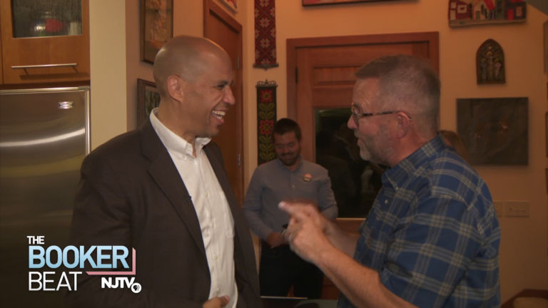 Flush with cash injection, Booker returns to Iowa