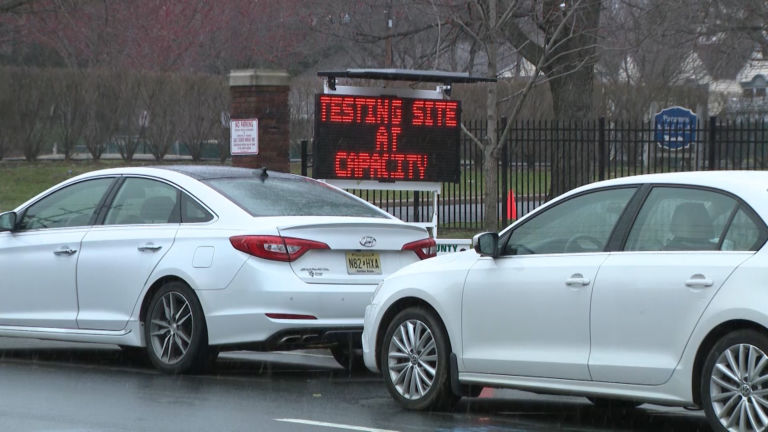 Capacity crowds at two coronavirus test sites force early closings