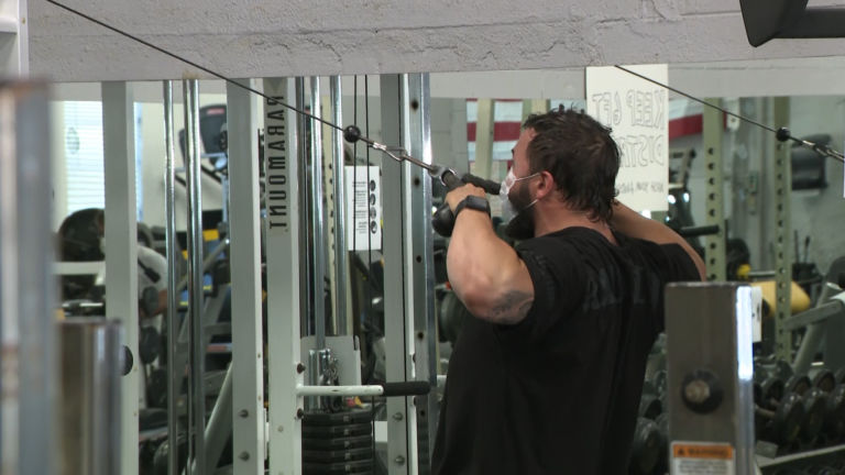 Gyms try to strong-arm their way open