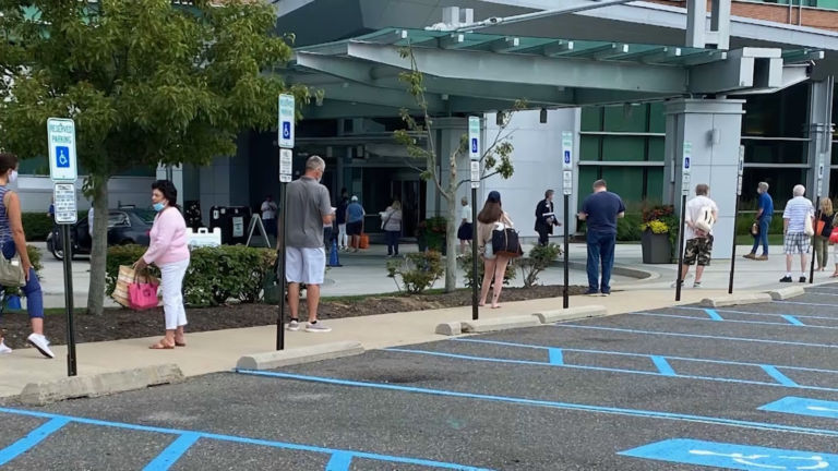 Families line up to visit loved ones in hospitals, nursing homes