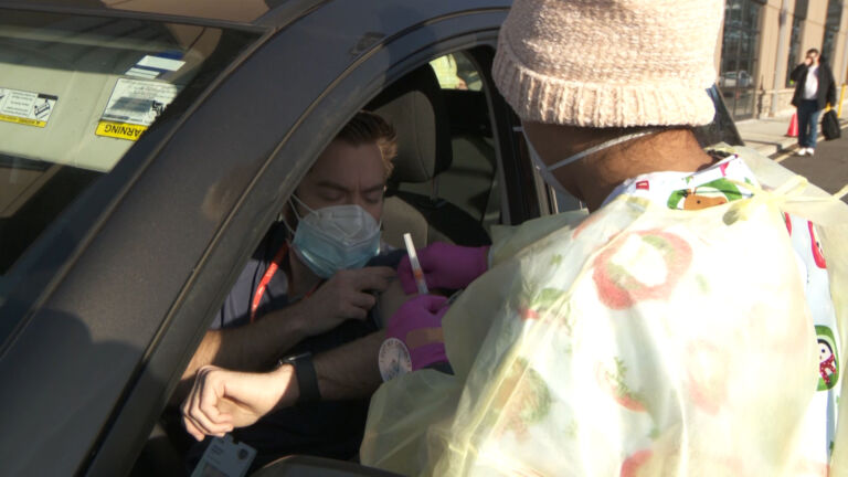 Toms River health care workers receive Moderna vaccine at drive-through clinic