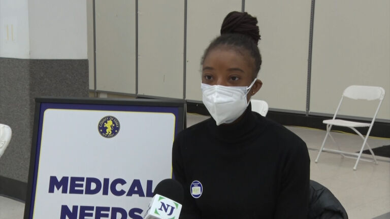 A one-woman campaign urging COVID-19 vaccination
