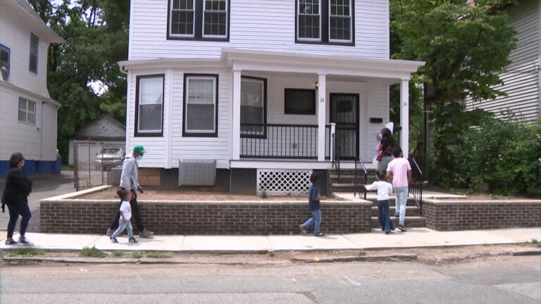 Three Newark families get keys to homes after winning housing lottery