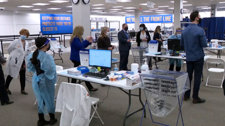Health care workers eager for COVID-19 booster are frustrated by wait