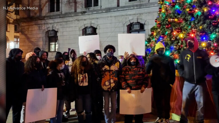Protestors rally outside Paterson City Hall over police shooting