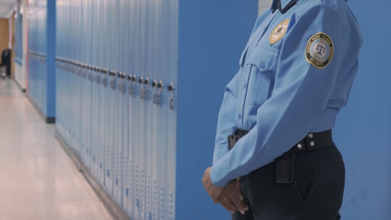 NJ schools hire more police officers