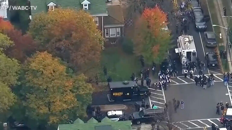 Two Newark police officers shot by gunman firing from rooftop