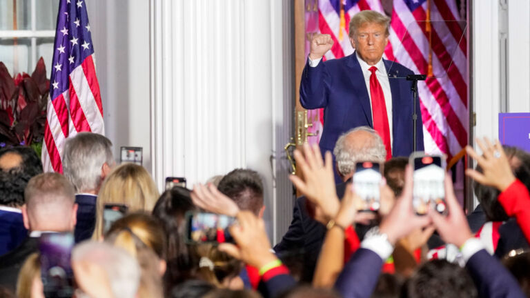 Defiant Trump returns to Bedminster