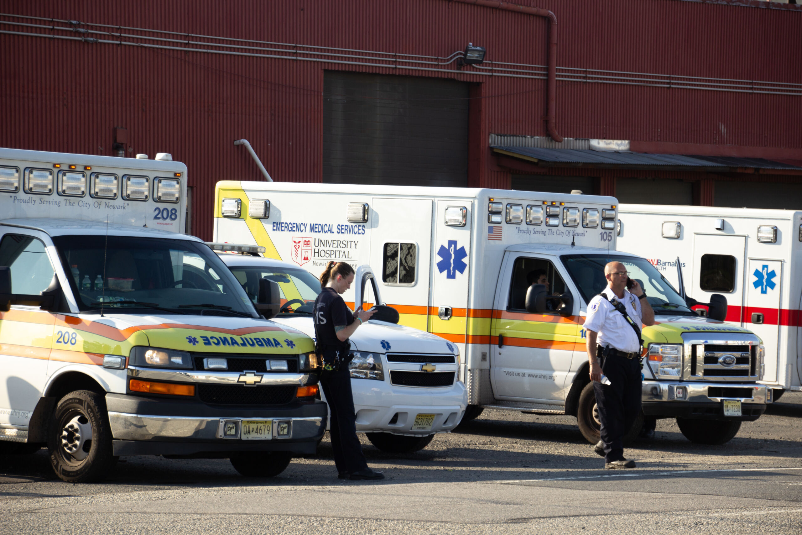 EMS crews on standby at the scene of a ship fire in Port Newark on Thursday, July 6, 2023.