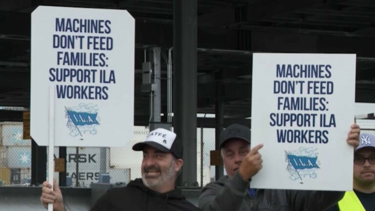 Longshoremen reach last-minute deal to avoid strike