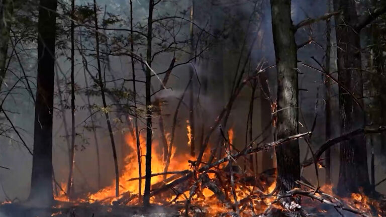 Firefighters are still battling West Milford wildfire