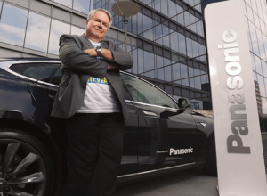 Panasonic North America CTO Todd Rytting poses with a Tesla Model S. - (AARON HOUSTON)